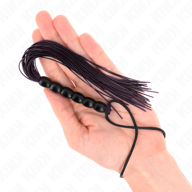 KINK - MINI FOUET EN SILICONE AVEC 6 BILLES NOIRES 26 CM - Sensualia