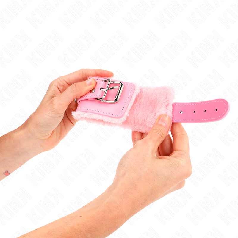 KINK - APPUI-POIGNETS DOUBLÉS DE FOURRURE ROSE AVEC CEINTURE ROSE RÉGLABLE 17-29 CM X 6 CM - Sensualia