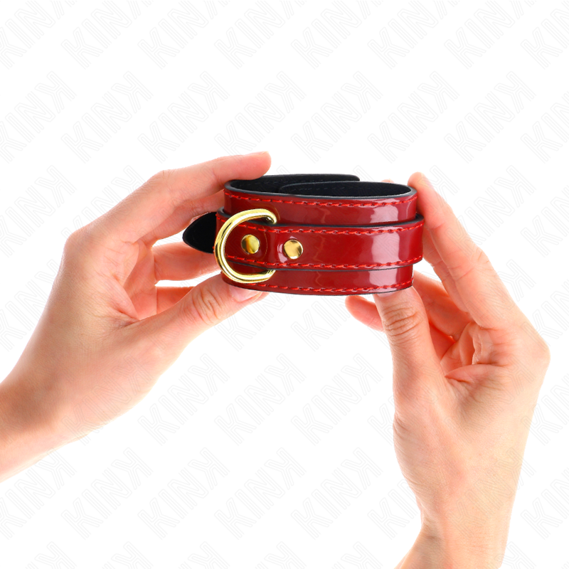 KINK - POIGNETS JOANNA ANGEL ROUGE AJUSTABLES AVEC CHAÎNE OR 16,5-26 CM X 4 CM - Sensualia